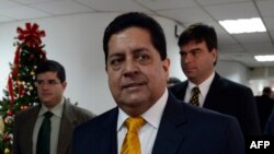 Aleldin Abuelkasem iz Egipta slavi nakon pobede u osmini finala za muškarce u mačevanju na Letnjim olimpijskim igrama 2020 u Čibiju u Japanu. 26. juli, 2021.
( Foto: Endrju Medikini / AP )