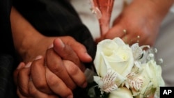 Pihak berwenang AS menangkap 50 orang yang diduga terkait "skema penipuan pernikahan berskala besar" di Texas. (Foto: ilustrasi).