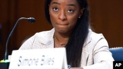 United States Olympic gymnast Simone Biles testifies during a Senate Judiciary hearing about the Inspector General's report on the FBI's handling of the Larry Nassar investigation on Capitol Hill, Sept. 15, 2021, in Washington. 