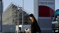 7일 일본 도쿄에서 마스크를 쓴 행인.