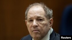 FILE - Former film producer Harvey Weinstein appears in court in Los Angeles.