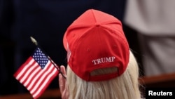U.S. Representative Marjorie Taylor Greene of Georgia applauds on the day of U.S. President Donald Trump's speech to a joint session of Congress, in the House Chamber of the U.S. Capitol in Washington, March 4, 2025.