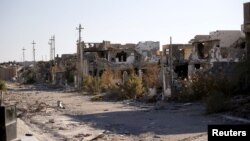 FILE - Destroyed buildings are seen in the city of Ramadi, January 16, 2016. Ramadi was freed of IS extremists in December 2015 after a fierce battle and more than 600 bombings left much of the city in ruins, 100 kilometers west of the capital, Baghdad.