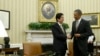 President Barack Obama shakes hands with Japan's Prime Minister Shinzo Abe at the end of their meeting in the Oval Office of the White House in Washington, Feb. 22, 2013.
