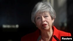 British Prime Minister Theresa May delivers a statement in London, May 24, 2019.