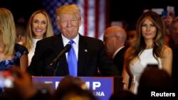 Republican presidential candidate Donald Trump smiles as he speaks at the start of a campaign victory party after rival candidate Sen. Ted Cruz dropped out of the race for the Republican presidential nomination, at Trump Tower in Manhattan, New York, May 3, 2016.