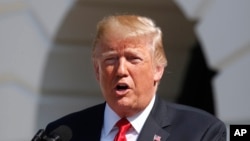 President Donald Trump delivers remarks on the economy from the South Lawn of the White House, July 27, 2018, in Washington. 