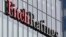 FILE - The Fitch Ratings logo is seen at their offices at Canary Wharf financial district in London, March 3, 2016. 