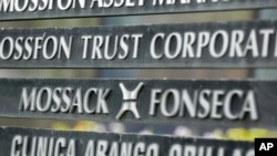 FILE - A marquee of the Arango Orillac Building lists the Mossack Fonseca law firm that gained world-wide attention through the so-called "Panama Papers," in Panama City, Panama, April 4, 2016. 