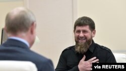 Head of the Chechen Republic Ramzan Kadyrov speaks during a meeting with Russia's President Vladimir Putin at a residence near Moscow, Aug. 31, 2019. (Sputnik/Alexei Nikolsky/Kremlin via Reuters) 