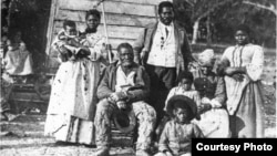 Several generations of a family are pictured on Smith's Plantation, South Carolina, ca. 1862. (photo courtesy of the Library of Congress)