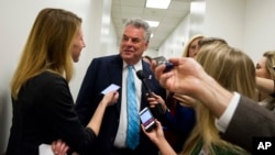 FILE - Rep. Peter King, R-N.Y. speaks with reporters on Capitol Hill in Washington, Nov. 15, 2016.