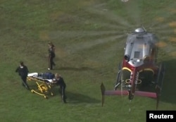 Spasioci su helikopterom doneli nosila na mesto pucnjave u opštinskom centru Virdžininja Biča, 31. maja 2019.