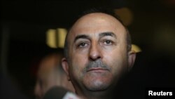 FILE - Turkish Foreign Minister Mevlut Cavusoglu speaks to reporters after the U.N. General Assembly emergency special session on U.S. President Donald Trump's decision to recognize Jerusalem as Israel's capital in Manhattan, New York, U.S., Dec. 21, 2017