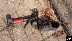 Image released by the Spanish Guardia Civil, Aug. 22, 2018, shows items used by alleged migrants after they stormed a fence to enter the Spanish enclave of Ceuta, Spain.