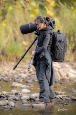 Anchalee Dulayathitikul carries a backpack and camera as a photographer during her weekend trip in MD.