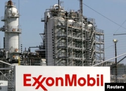 FILE - A view of the ExxonMobil refinery in Baytown, Texas.