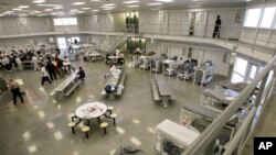 FILE - The "B" cell and bunk unit of the Northwest Detention Center in Tacoma, Washington, is seen in a Oct. 17, 2008, photo.