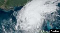 اس سیٹلائٹ فوٹو میں دیکھا جا سکتا ہے کہ سمندری طوفان ’ملٹن‘ خلیج میکسیکو میں سے گزر رہا ہے۔ 9 اکتوبر، 2024، رائٹرز