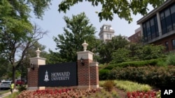 An electronic signboard welcomes people to the Howard University campus in Washington. (AP Photo/Jacquelyn Martin, File)