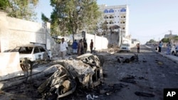 Wreckage is seen after an attack outside the Jazeera Hotel in Mogadishu, Jan. 2, 2014. 