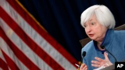 Federal Reserve Board Chair Janet Yellen answers a reporter's question during a news conference about the Federal Reserve's monetary policy, Dec. 14, 2016, in Washington. 
