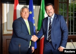 Italian Interior Minister Matteo Salvini meets with Hungarian Prime Minister Viktor Orban in Milan, Italy, Aug. 28, 2018.