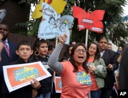 Cristina Jimenez speaks to demonstrators urging the Democratic Party to protect the Deferred Action for Childhood Arrivals program outside the office of California Democratic Sen. Dianne Feinstein in Los Angeles, Jan. 3, 2018. California has the largest number of people who are affected by the program.