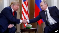 Presiden AS Donald Trump saat bertemu Presiden Rusia Vladimir Putin di Helsinki, Finlandia 16 Juli 2018.