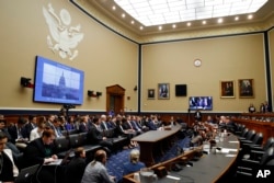 Facebook CEO Mark Zuckerberg testifies before a House Energy and Commerce hearing on Capitol Hill in Washington, April 11, 2018, about the use of Facebook data.