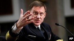 FILE - National Security Agency Director Admiral Mike Rogers testifies on Capitol Hill in Washington, May 9, 2017, before the Senate Armed Services Committee. 