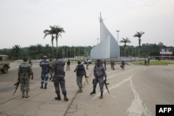 Gabonese gendarmes patrol on the Democracy square in Libreville, Jan. 7, 2018, after a group of soldiers sought to seize power in Gabon.