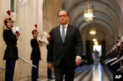 French President Francois Hollande arrives to deliver a speech at the Versailles castle, west of Paris, Nov. 16, 2015.
