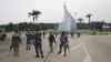 Gabonese gendarmes patrol on the Democracy square in Libreville, Jan. 7, 2018, after a group of soldiers sought to take power while the country's ailing president was abroad.