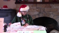 Volunteer Elves Answer Letters to Santa Claus