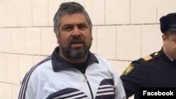 Əlzamin Salayev məhkəmədən aparılarkən