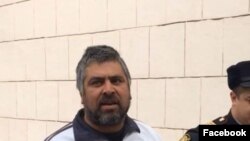 Əlzamin Salayev məhkəmədən aparılarkən