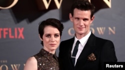 FILE - Actors Claire Foy, who plays Queen Elizabeth II, and Matt Smith, who plays Philip Duke of Edinburgh, attend the premiere of "The Crown" Season 2 in London, Nov. 21, 2017. 