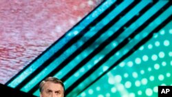 Brazilian President Jair Bolsonaro speaks during the Future Investment Initiative forum in Riyadh, Saudi Arabia, Oct. 30, 2019. 