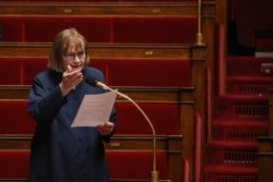 FILE - French Communist Party (PCF) deputy Marie-George Buffet attends a session of questions to the Government at the French National Assembly in Paris, Apr. 14, 2020.