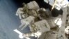 Spacewalking Astronauts Install Better Station Batteries
