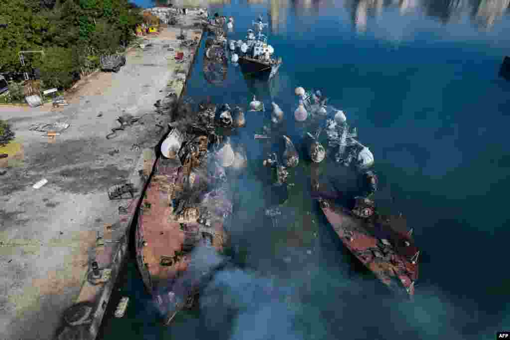 An aerial photo shows Syrian naval ships destroyed during an overnight Israeli attack on the port city of Latakia.&nbsp;The U.N. special envoy for Syria called on Israel to halt its military movements and bombardments inside Syria, days after the fall of president Bashar al-Assad.