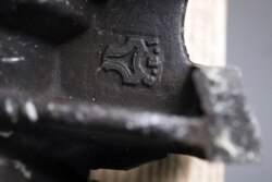 An embossment representing Iranian company Shahid Bagheri Industries shows on an Iranian ballistic missile remnant on display at Joint Base Anacostia-Bolling in Washington, D.C.