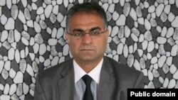 ناسر باباخانی مامۆستای زانکۆ و چاودێری سیاسی