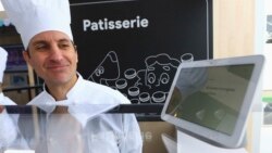 In this Jan. 8, 2019 photo shows the Google Assistant, which includes an "interpreter mode" that enables some of Google's smart home devices to work as a translator, at the Google display area at CES International in Las Vegas.