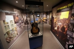 U.S. musician Jimi Hendrix's Epiphone acoustic guitar is displayed in an exhibition space at the central London flat he used to live in at 23 Brook Street, London, Feb. 8, 2016.