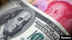 FILE - A host of U.S. companies have warned that costs related to tariffs on goods imported from China will hit their profits and hurt consumers. 