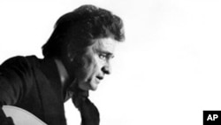 This is a 1977 photo of country western musician Johnny Cash.