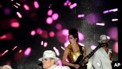 In this photo provided by the Las Vegas News Bureau, performers dance during a preview of the new Cirque du Soleil show “Michael Jackson ONE”, Feb. 21, 2013.