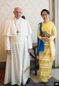 Aung San Suu Kyi met Pope Francis at the Vatican in May.